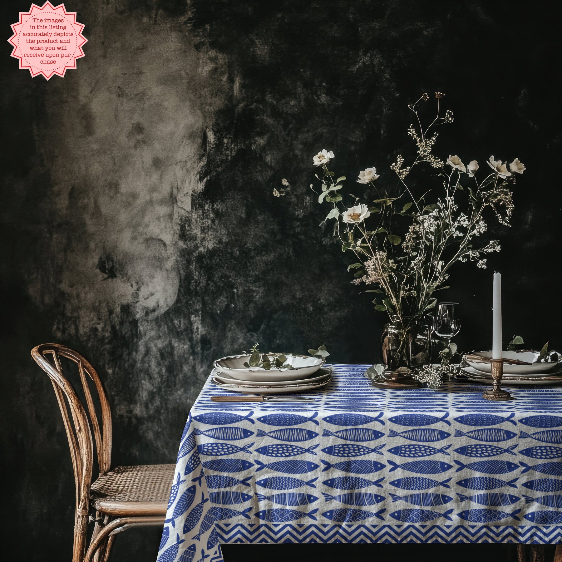 Blue fish cotton tablecloth styled for a coastal seafood dinner party.
