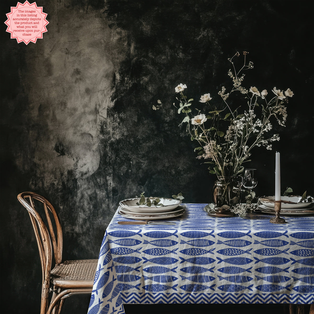 Blue fish cotton tablecloth styled for a coastal seafood dinner party.