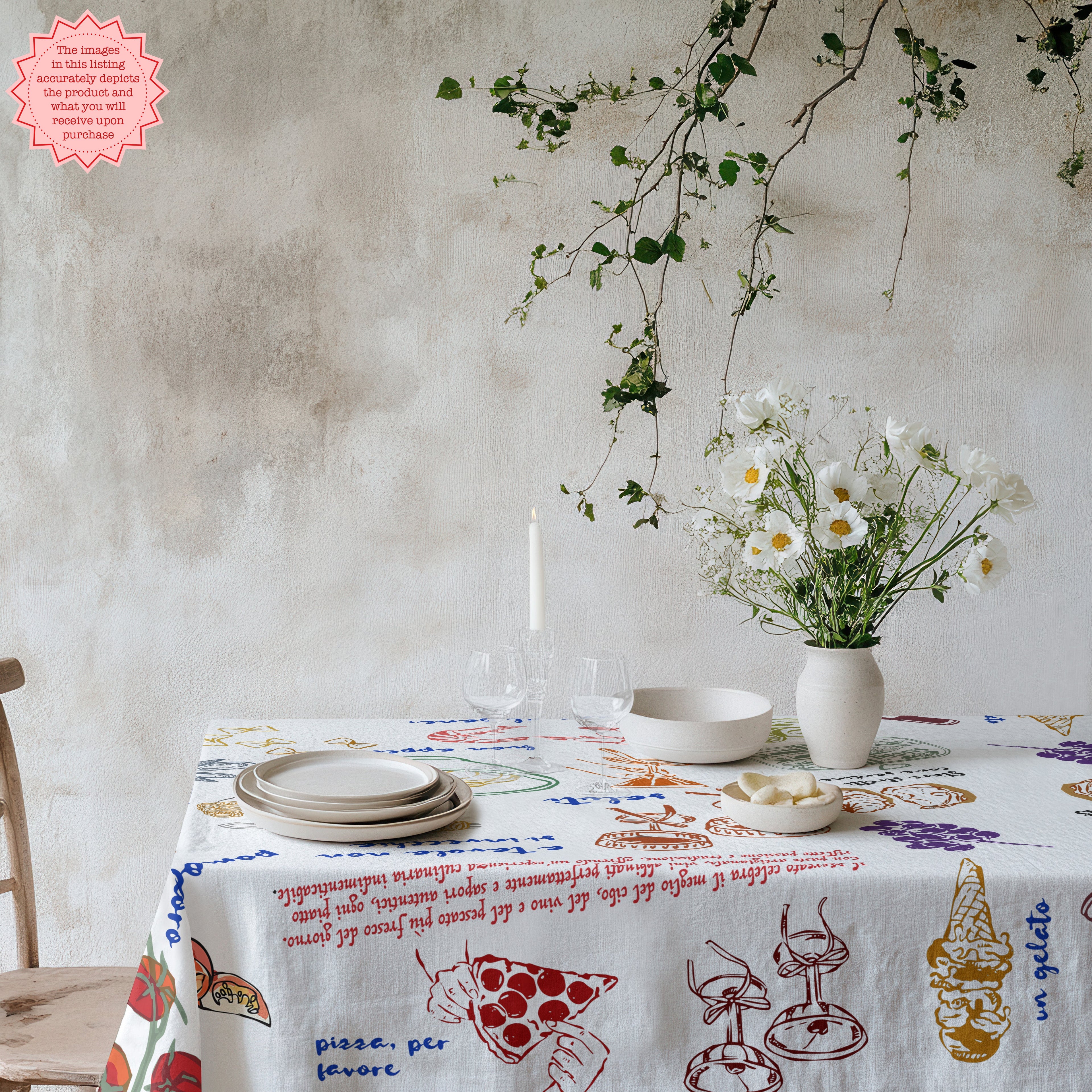 Pizza night table setting with Italian food print tablecloth for casual dinner party decor.