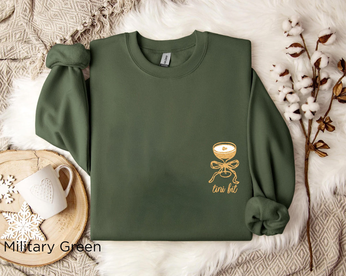 A Tini Bit Older embroidered martini sweatshirt styled as a cocktail birthday outfit.