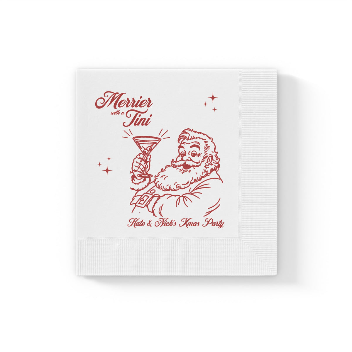 Close-up of Merrier with a Tini Christmas napkin showing the festive red Santa illustration holding a martini glass and elegant script lettering.