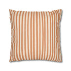 Colourful terracotta Halloween inspired faux suede cushion cover styled on a sofa as playful autumn and Halloween home décor.