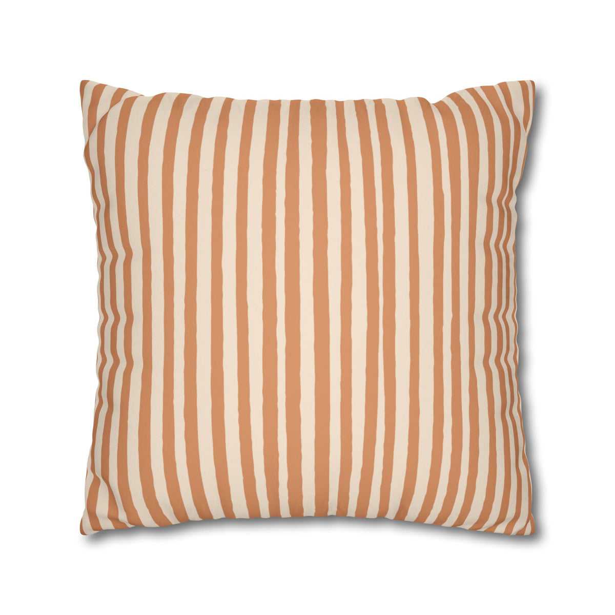 Colourful terracotta Halloween inspired faux suede cushion cover styled on a sofa as playful autumn and Halloween home décor.