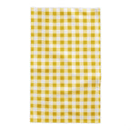 Yellow and white gingham tablecloth styled for a relaxed lunch or gathering with family and friends.