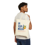 Close-up of Italian lemon artwork on premium cotton canvas tote bag with bold La Vita è Bella lettering.
