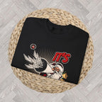 Close-up of detailed retro Christmas graphic printed on a cozy sweatshirt
