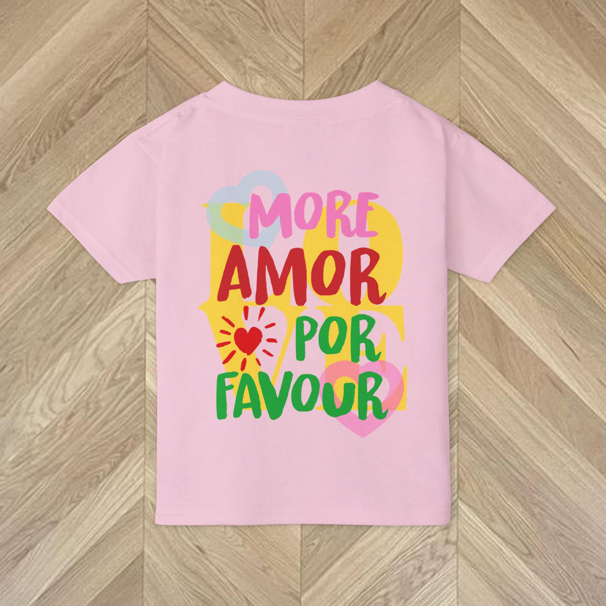 Light Pink Kids More Amore Por Favour T-shirt showing back text colourful statement design on the back.