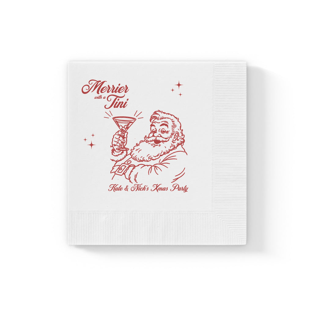 Soft three-ply white paper Christmas cocktail napkin featuring the Merrier with a Tini festive Santa illustration.