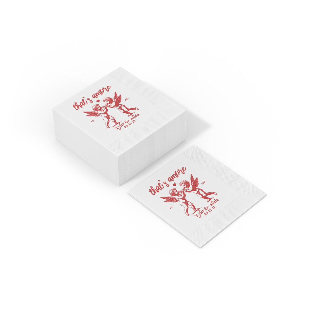 Custom wedding beverage napkins featuring a classic cherub design, personalized with the couple's names and wedding date.