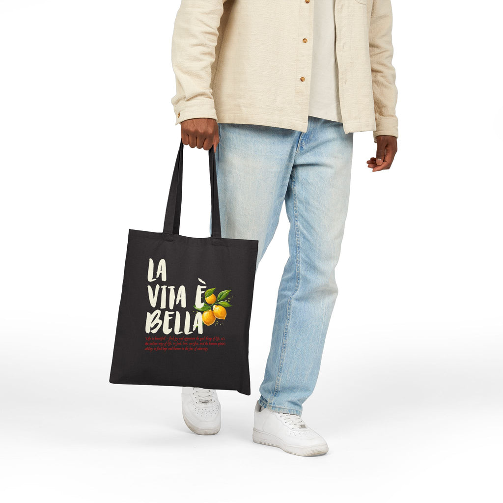 Italian coastal-inspired canvas tote with lemon illustration and La Vita è Bella typography designed for everyday adventures.