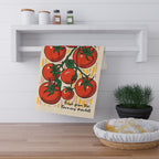 Vibrant red tomato pattern on a cotton tea towel, highlighting the colorful and playful summer market design.