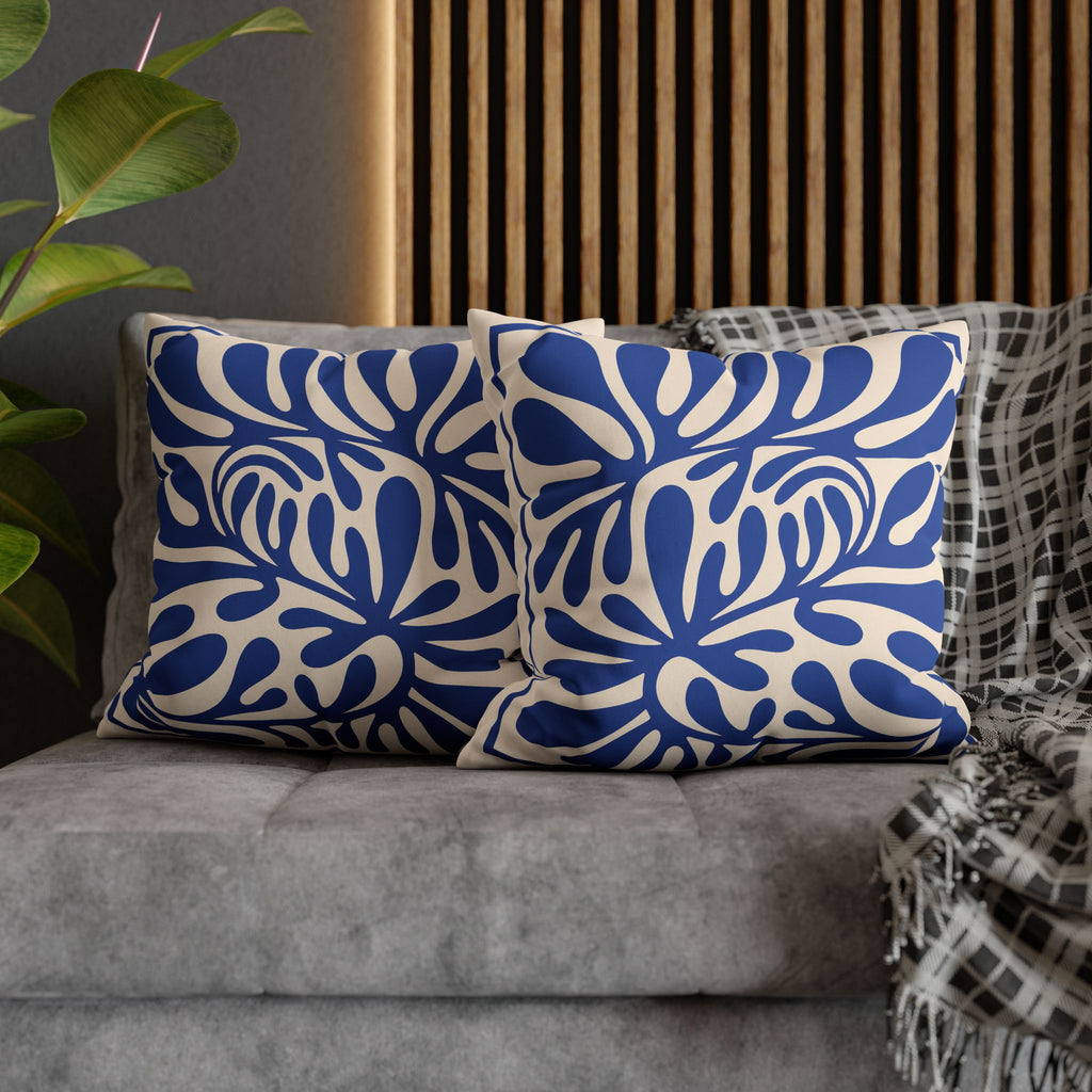 Abstract decorative cushion styled for modern home décor with clean lines and artistic botanical shapes.