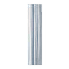 Modern coastal dining decor featuring a slate blue hand drawn stripe table runner and minimalist accessories