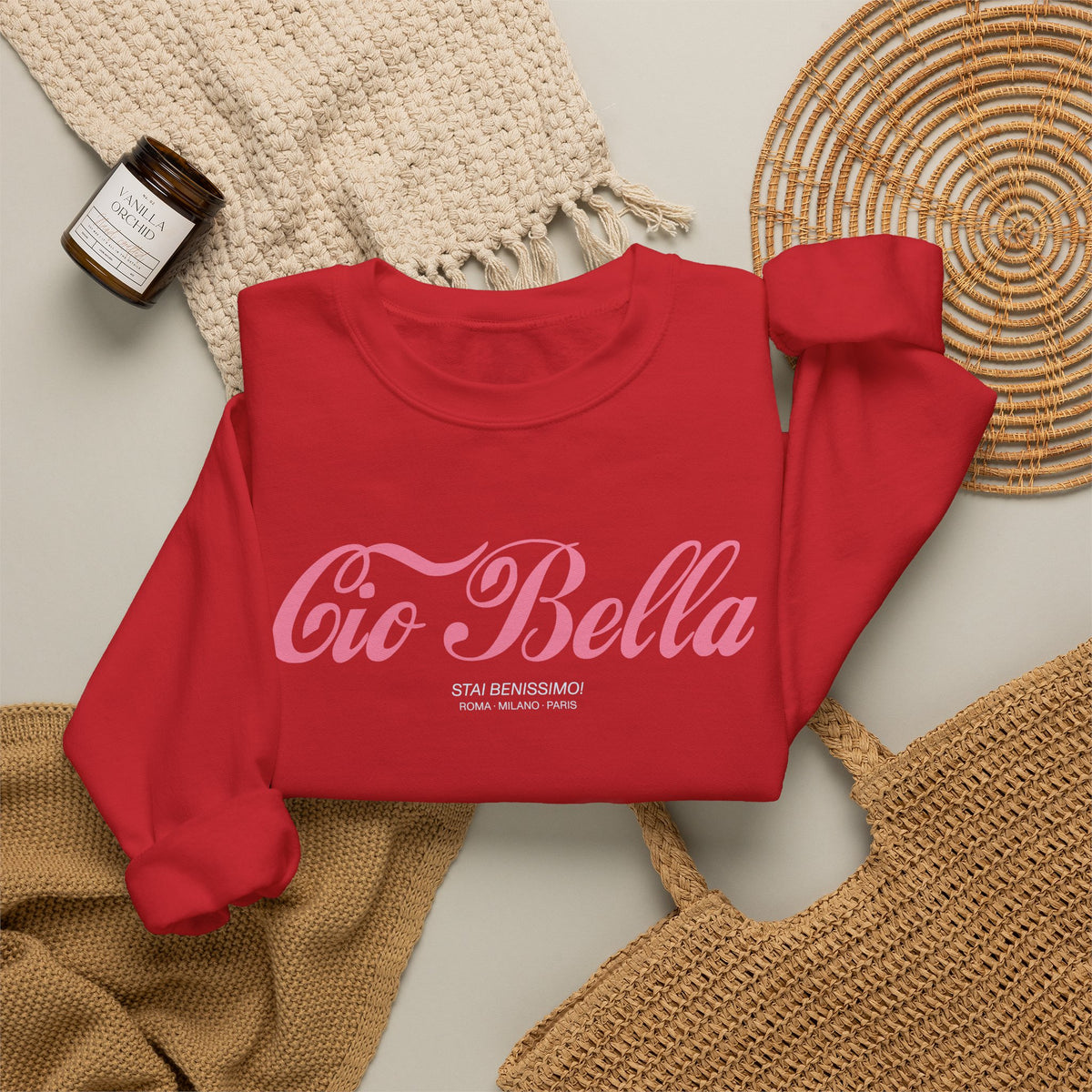 Folded Cio Bella sweatshirt close-up featuring STAI BENISSIMO and Roma Milano Paris editorial typography