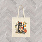 Mediterranean lifestyle tote bag featuring a black cat artwork inspired by Italian, Greek, and coastal European aesthetics.