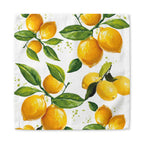 Watercolor lemon cloth napkins styled for summer entertaining, farmhouse kitchen decor, and beautiful table arrangements