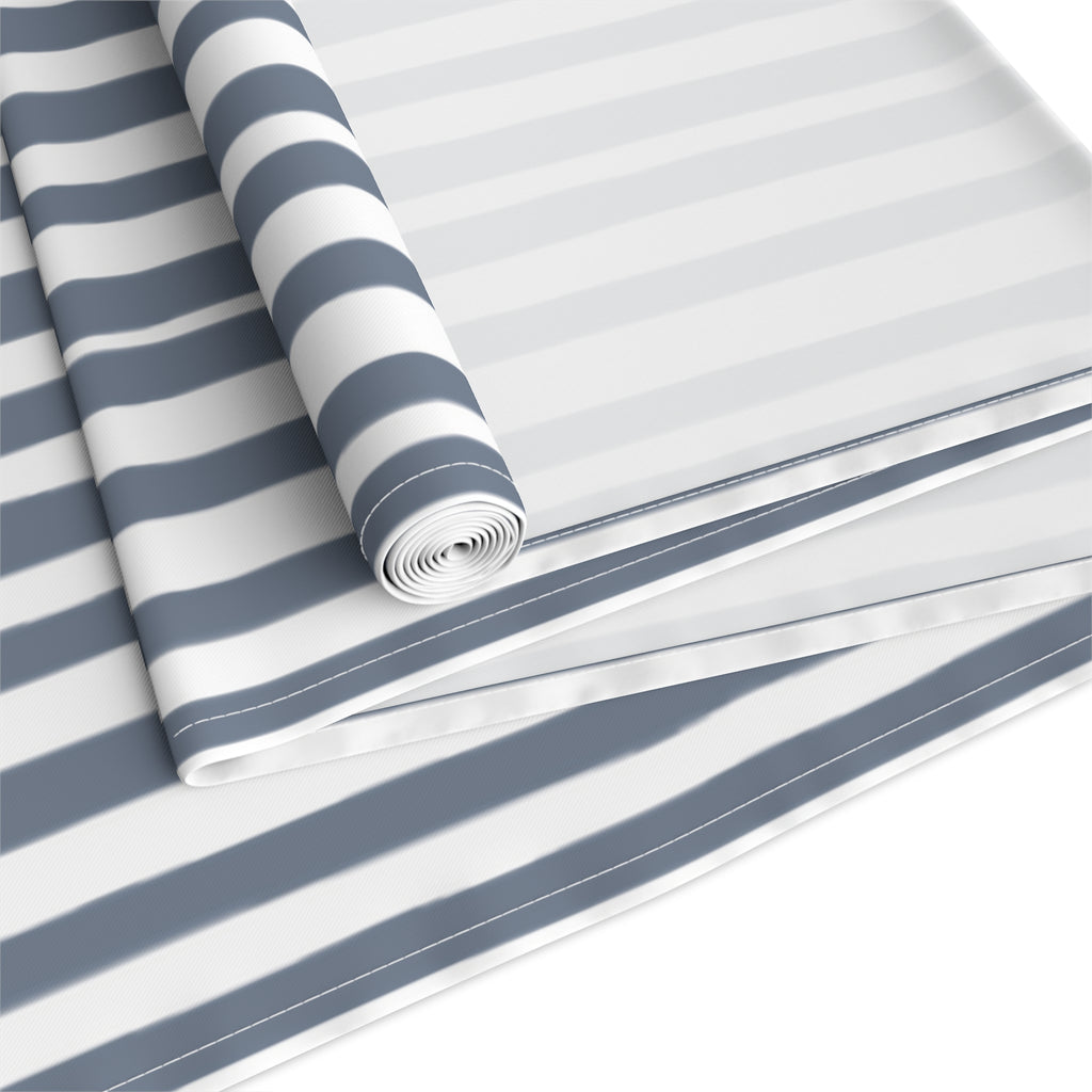 Modern coastal dining decor featuring a slate blue hand drawn stripe table runner.