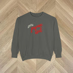 Close-up of the Joyeux Noël lettering and delicate botanical print on a French-inspired Christmas sweatshirt