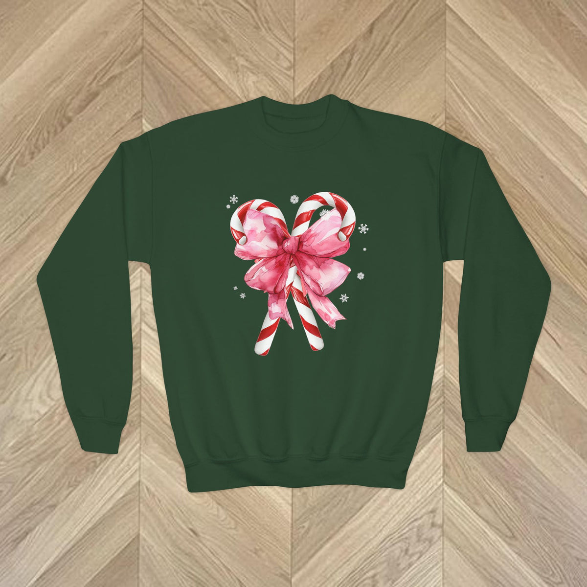 Youth crewneck Christmas sweatshirt featuring festive candy cane artwork