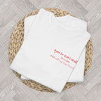 Front view of a personalised That's Amore wedding tee printed on a Gildan 5000 heavy cotton unisex t-shirt with custom bridal party details.