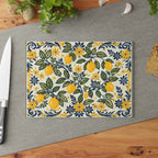 Tempered glass cutting board featuring a vibrant botanical lemon pattern inspired by the Amalfi Coast