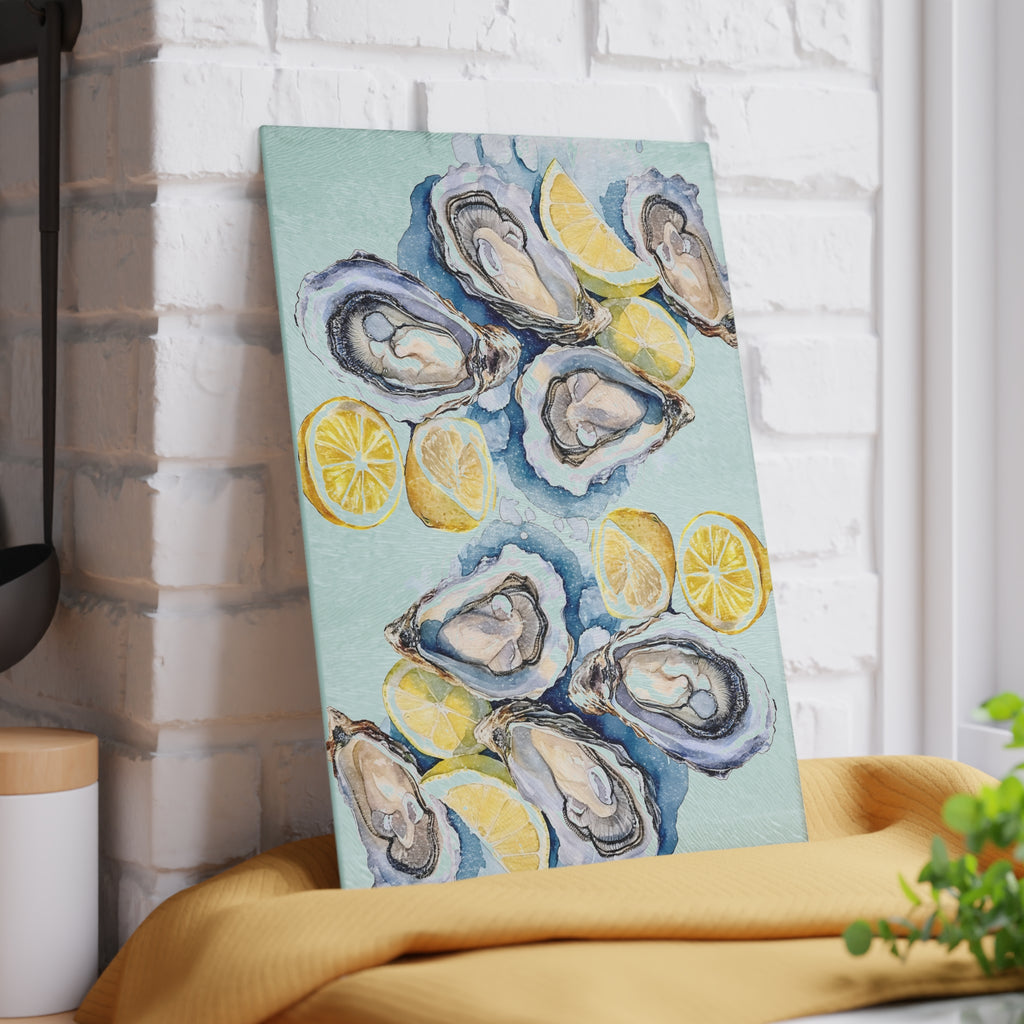 Coastal kitchen accessory with oyster shells, lemon slices and watercolor artwork printed on a durable glass cutting board