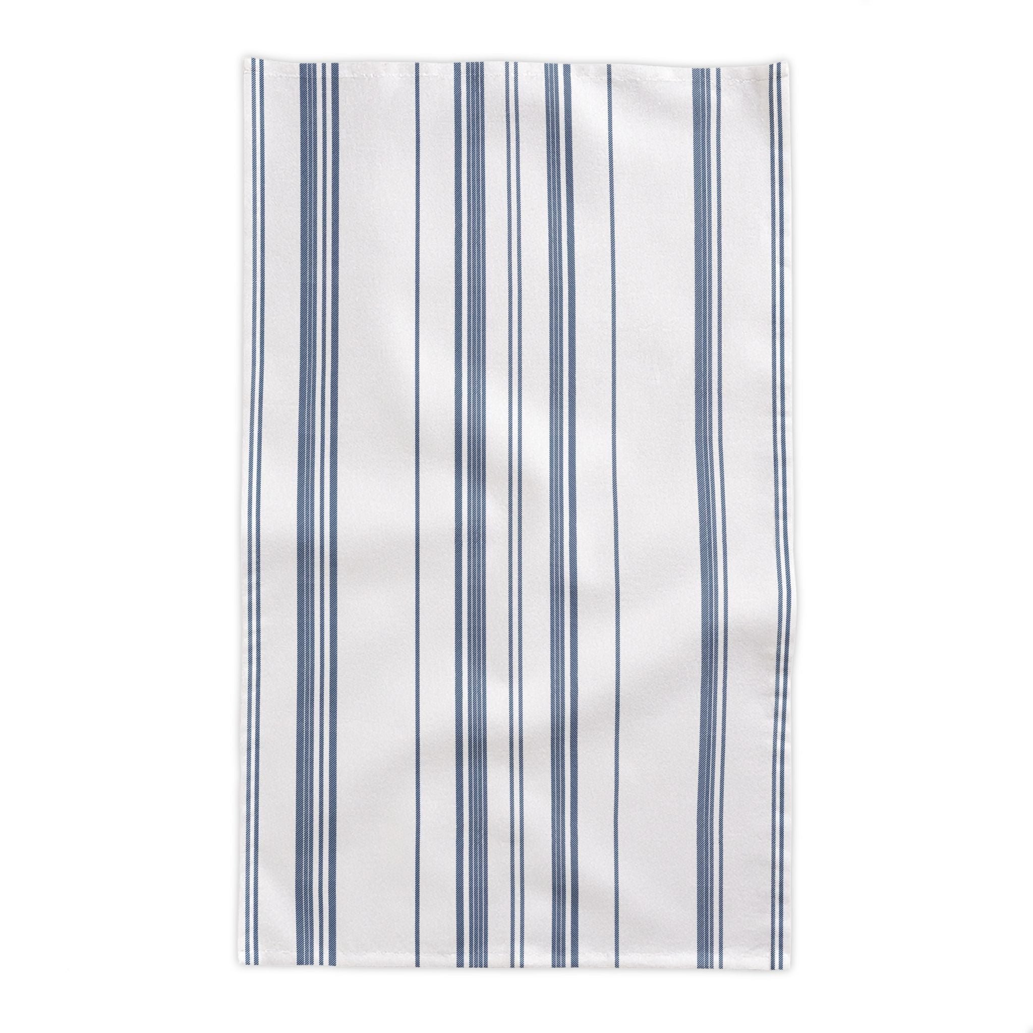 French Riviera Heritage Stripe Tablecloth displayed in a sophisticated dining setting with rustic furniture and Mediterranean farmhouse accents.