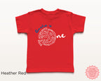 Heather red toddler tee with custom ‘Amelia is One’ pizza illustration in blue and white, Italian pizza party first birthday shirt for kids.
