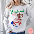 Cozy French-inspired crewneck with coffee and croissant graphic.