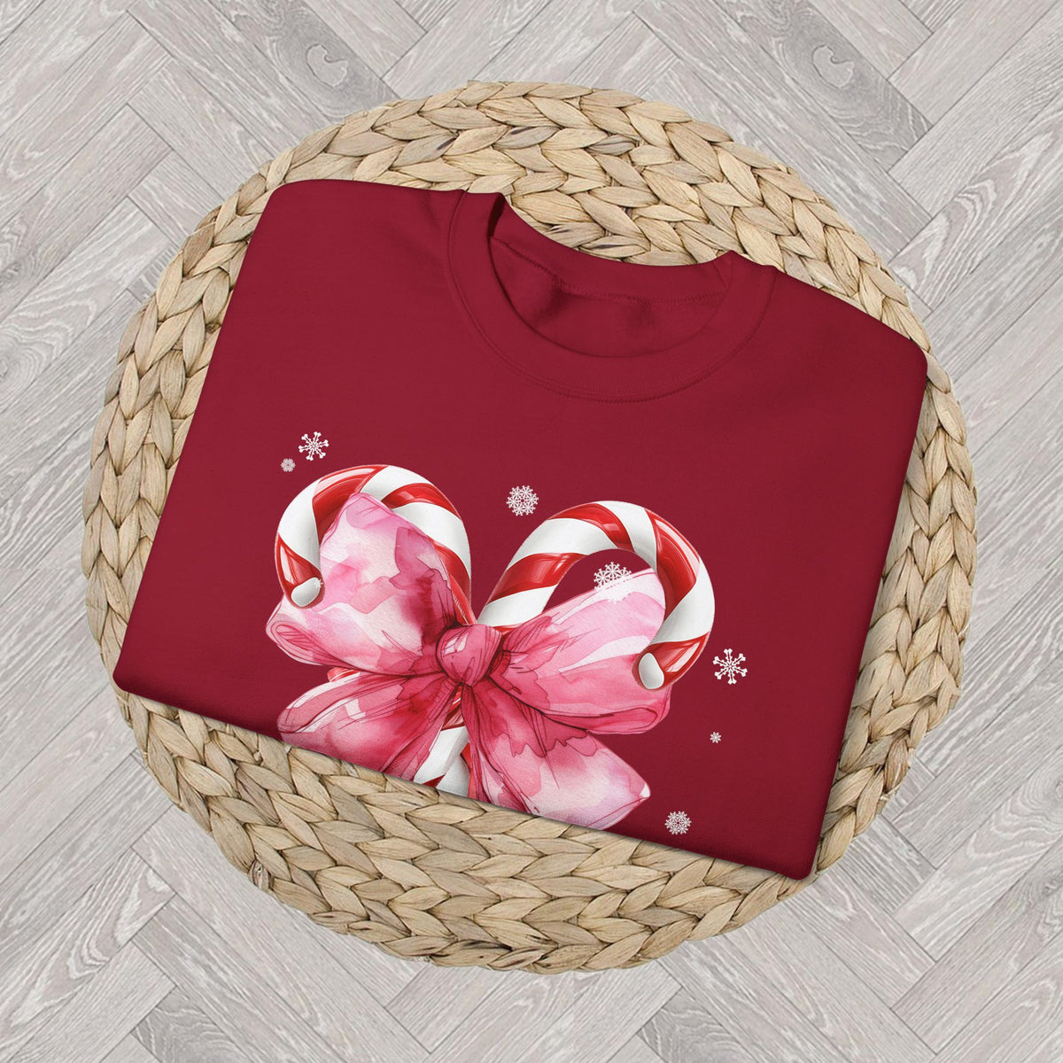 Close-up view of candy cane Christmas sweatshirt DTG printed design with vibrant holiday details
