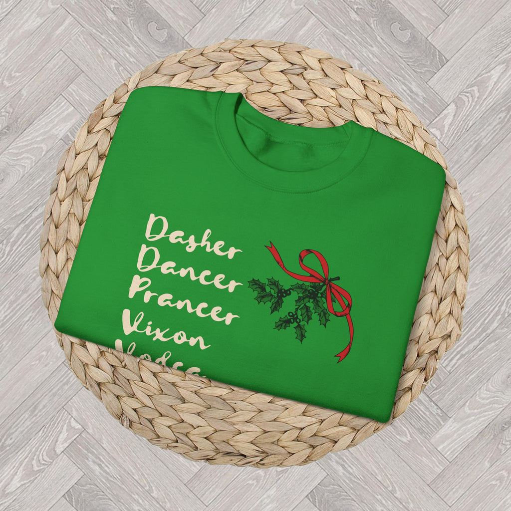 Close-up of the funny Christmas sweatshirt graphic featuring reindeer names mixed with vodka, whiskey and tequila in playful cream script.