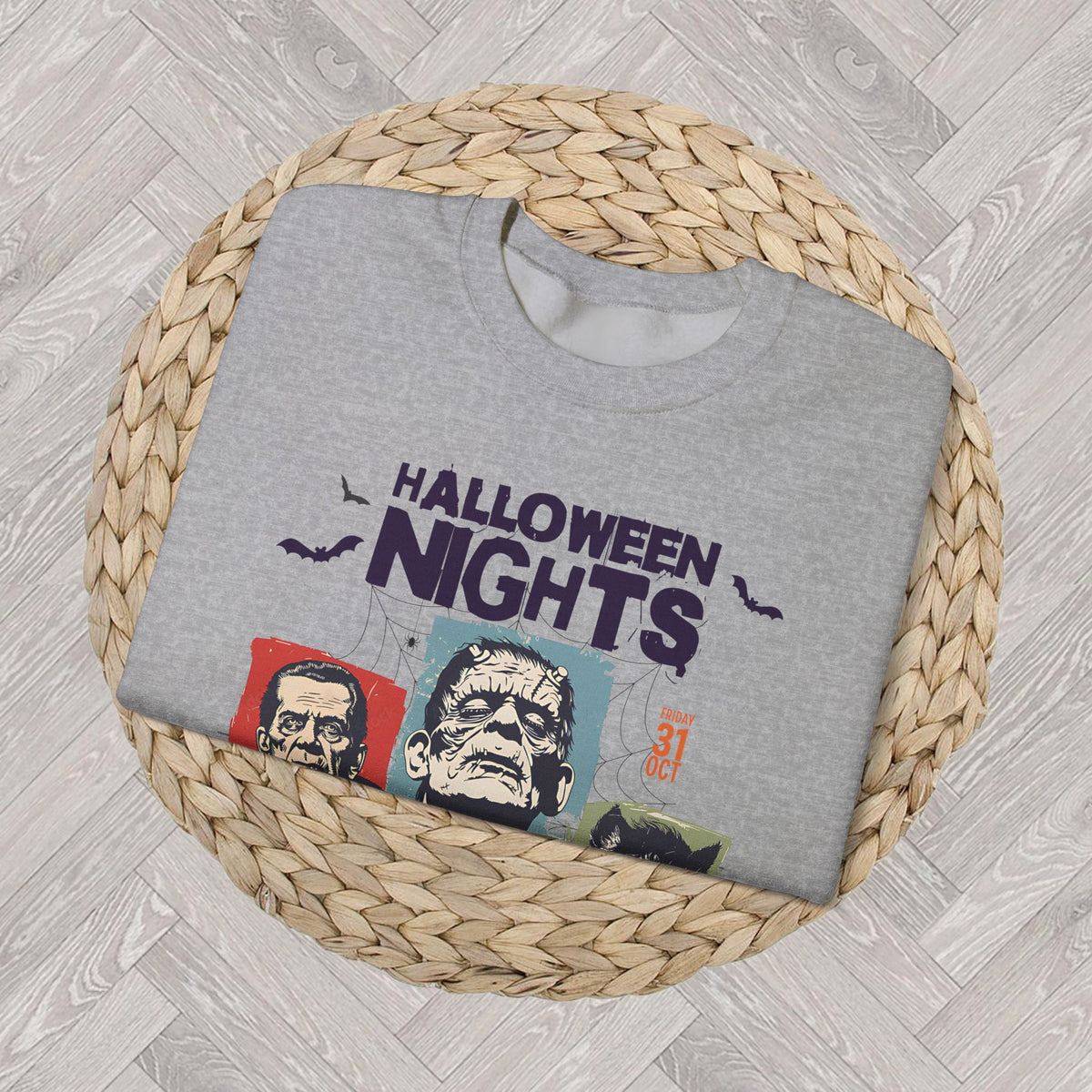 Close-up of the Horror Nights Halloween graphic sweatshirt showcasing its classic horror movie-inspired design and bold spooky-season lettering.