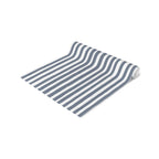 Slate blue table runner measuring 16 by 90 inches styled for an extended dining table setting