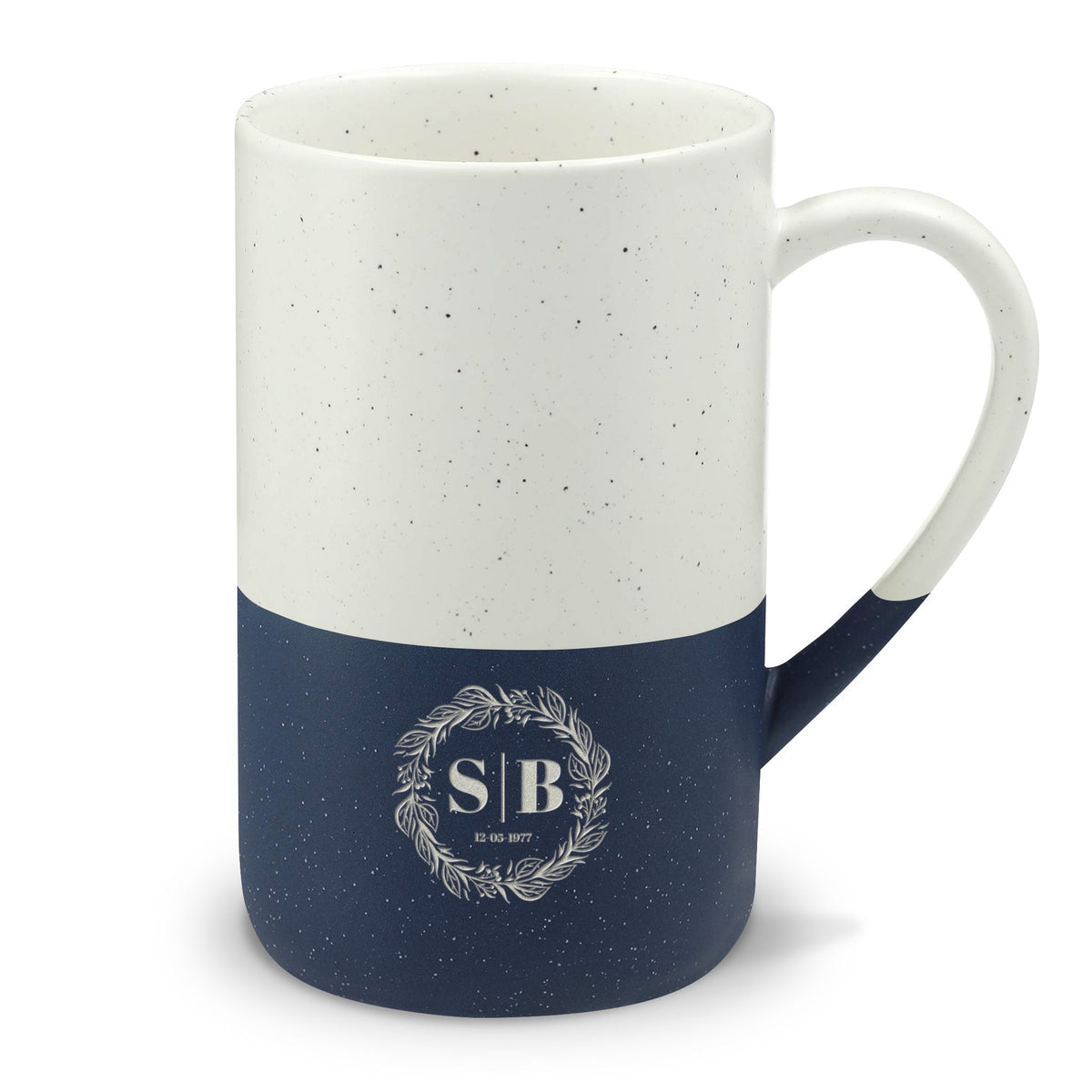 Close-up of Navy Speckled Wayland ceramic mug's speckled semi-gloss upper finish and natural matte-glazed base.