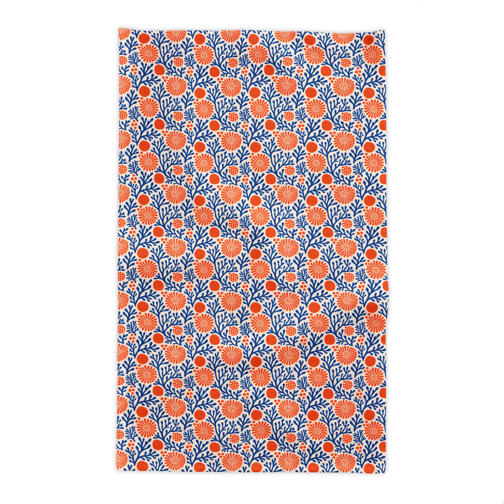 Coral reef pattern tablecloth in blue and terracotta designed for Mediterranean-inspired tablescapes and entertaining.