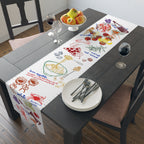 European-inspired table runner styled for summer entertaining and family gatherings.
