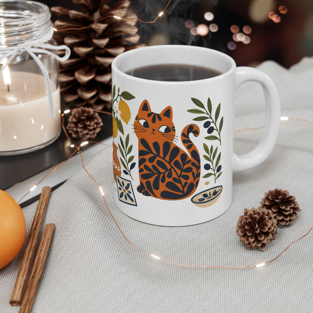 Double-sided ceramic mug featuring a Matisse-style cat design with olive branches and Mediterranean décor elements.