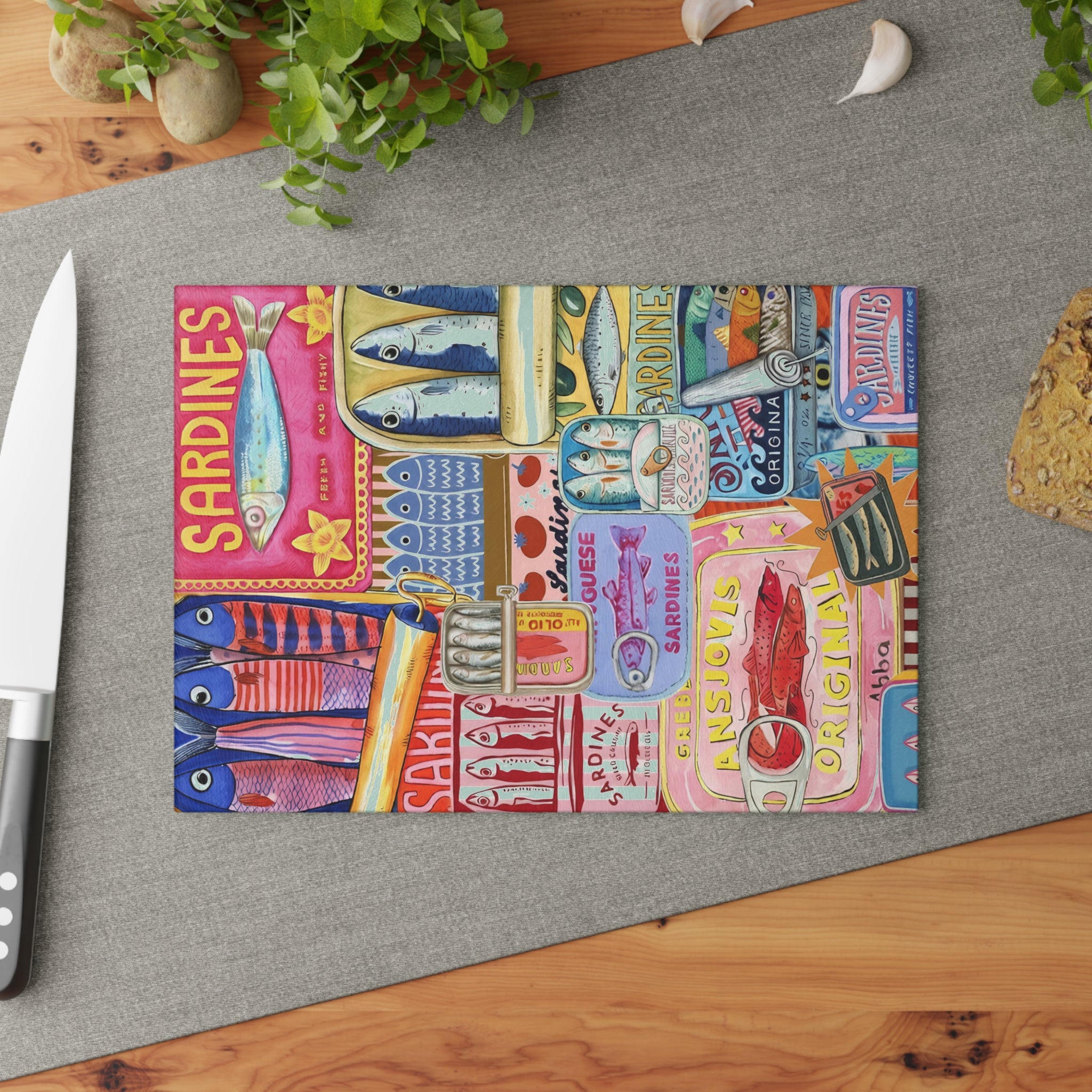 Mediterranean sardine cutting board shown in a kitchen setting as functional kitchen art
