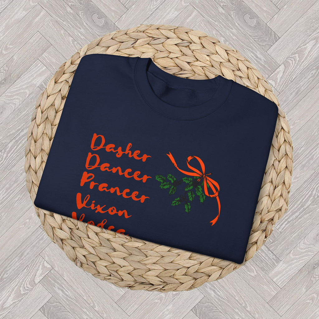 Detail of the orange Christmas lettering and green holly illustration on the Ash grey festive crewneck sweatshirt.