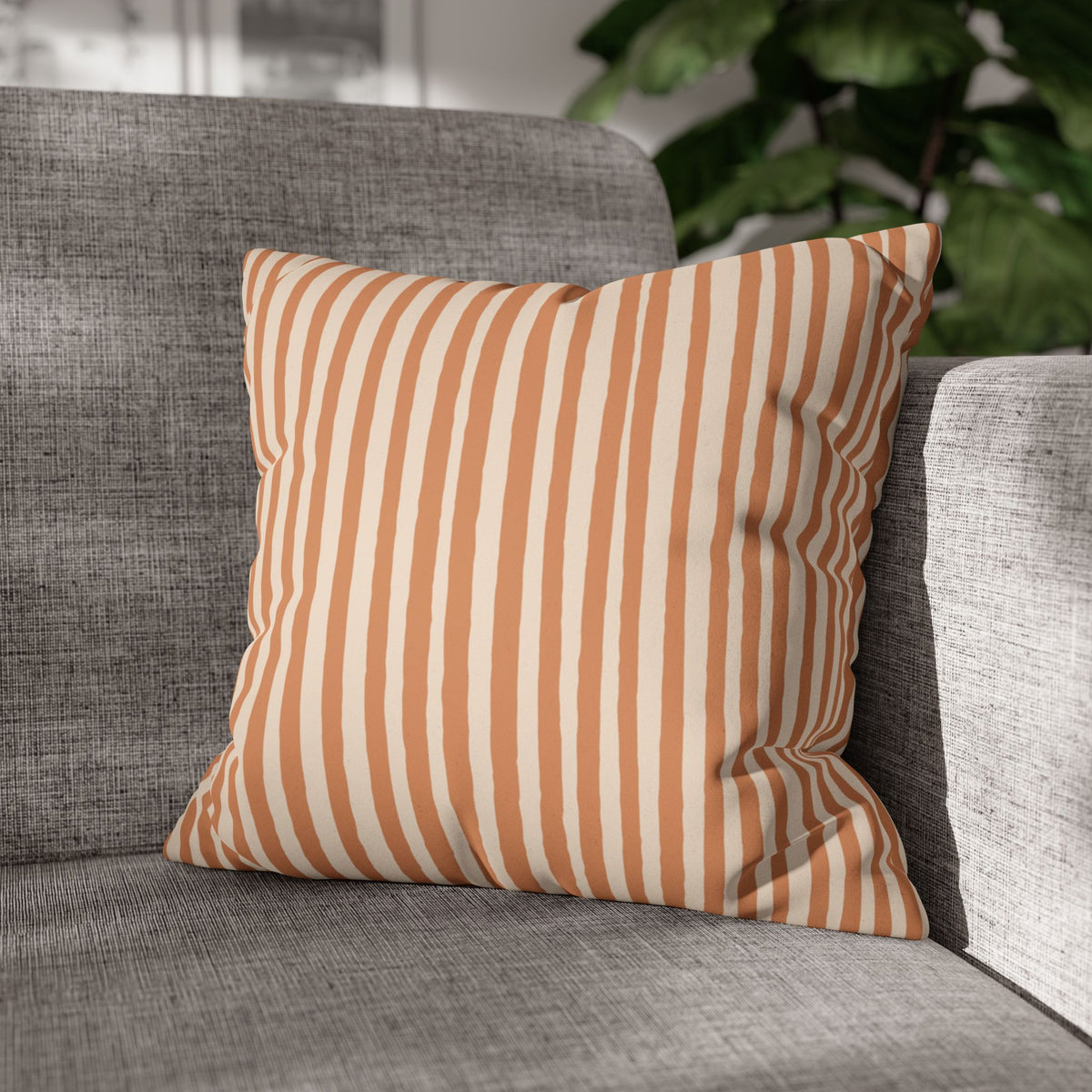 Close-up of the soft-textured 100% faux suede fabric on a colourful terracotta Halloween decorative pillowcase.