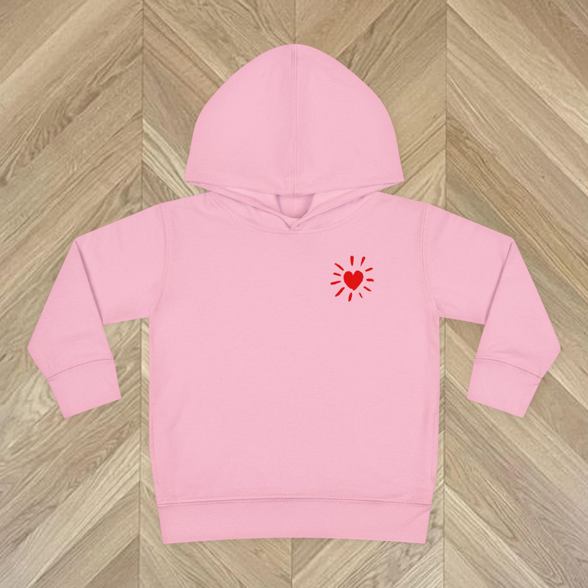 Close-up front of bright colourful heart icon print on front chest of More Amore Por Favor toddler hoodie, DTG soft ink