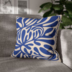 Statement decorative throw pillow featuring bold organic leaf artwork inspired by Mediterranean aesthetics.
