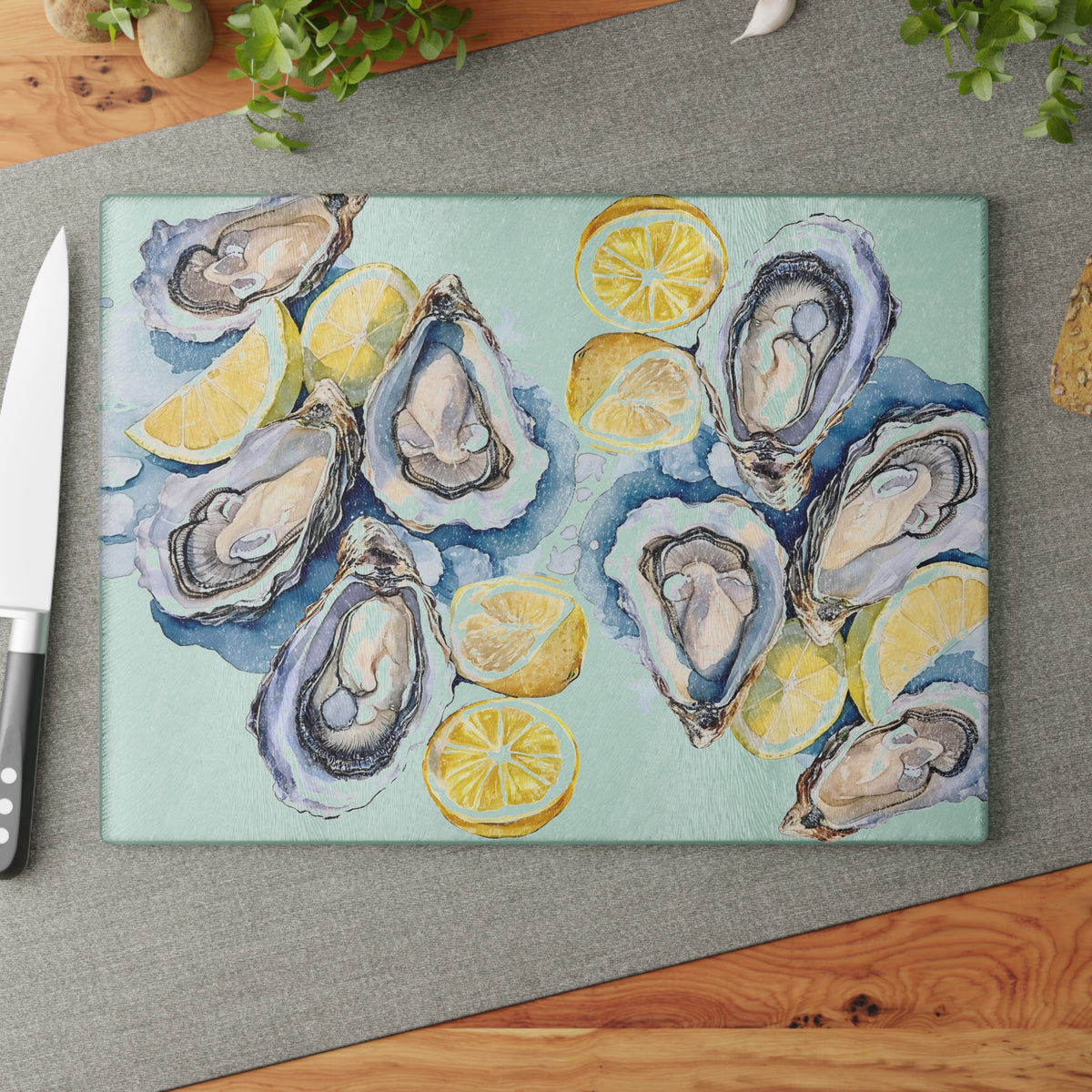 Large glass cutting board featuring elegant watercolor oysters and lemons design for seafood lovers and coastal kitchens