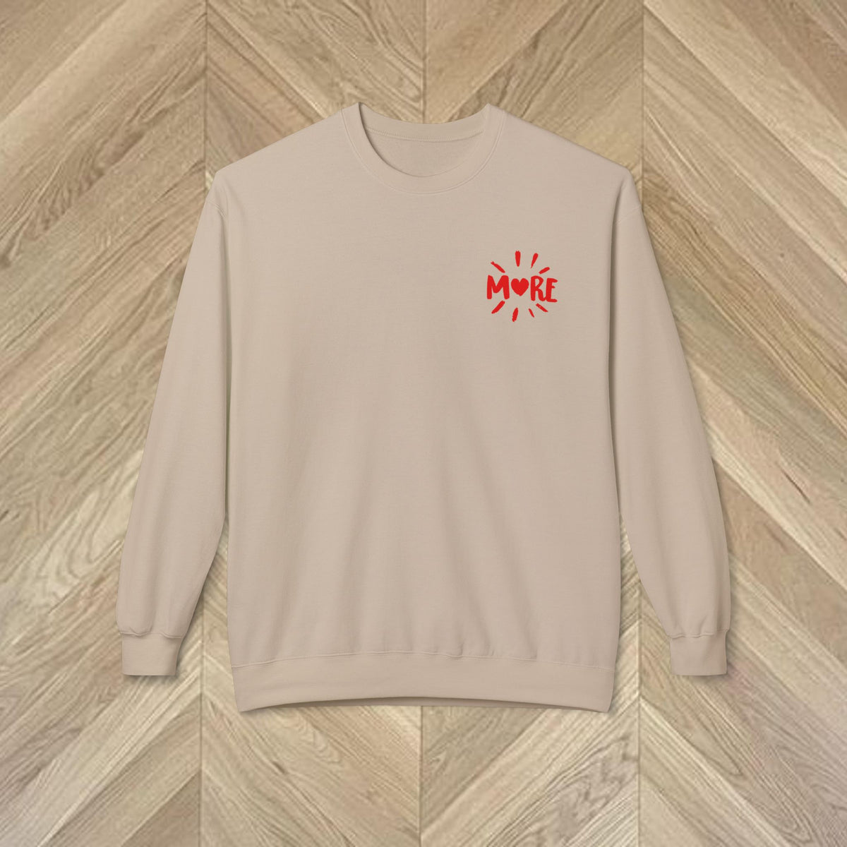 Front view of the Sand More Amore Por Favour sweatshirt with a small colourful heart detail within the word MORE on the upper left chest.