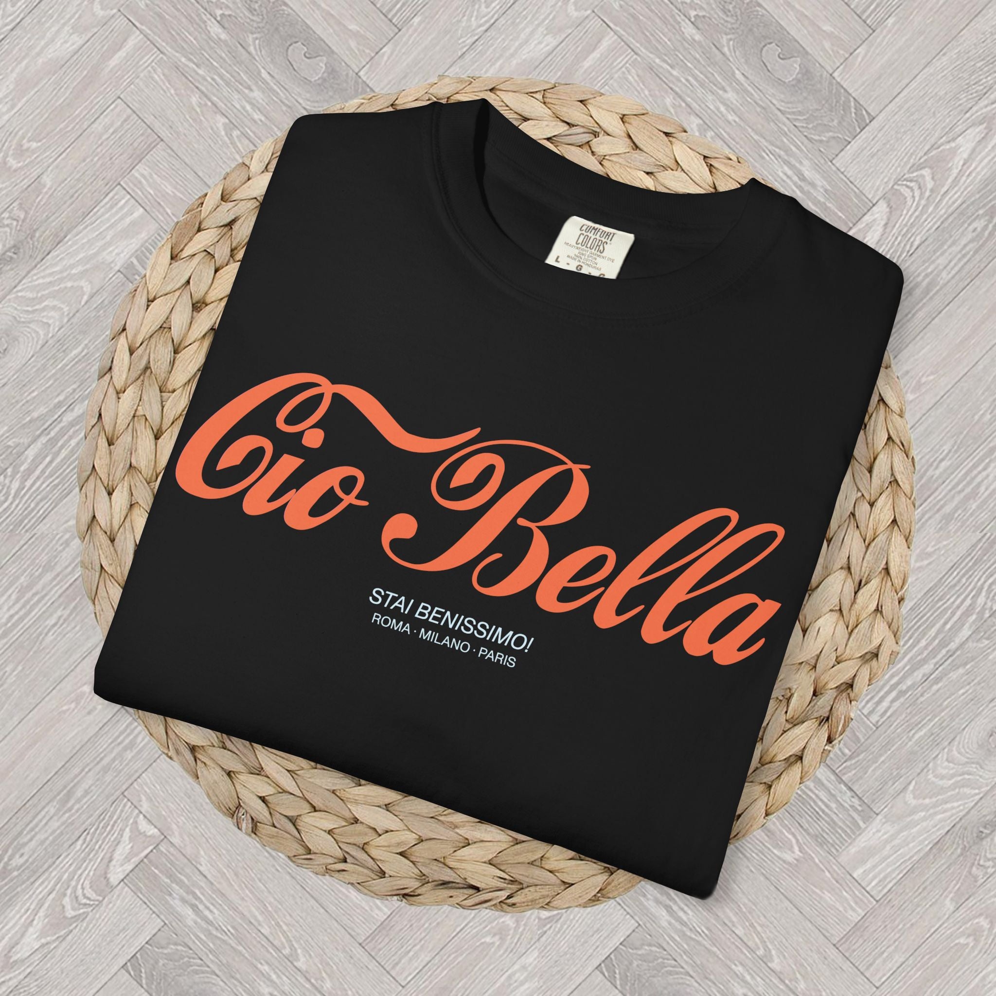 Close-up detail of the Cio Bella t-shirt print showing retro script lettering and Italian fashion-inspired design