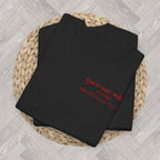 Flat lay of a personalised That's Amore bachelorette t-shirt with custom wedding date, designed for matching bride tribe outfits and hen celebrations.