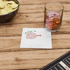 Personalized luncheon napkin for a pizza-themed first birthday party, printed with the child's name and birthday date.