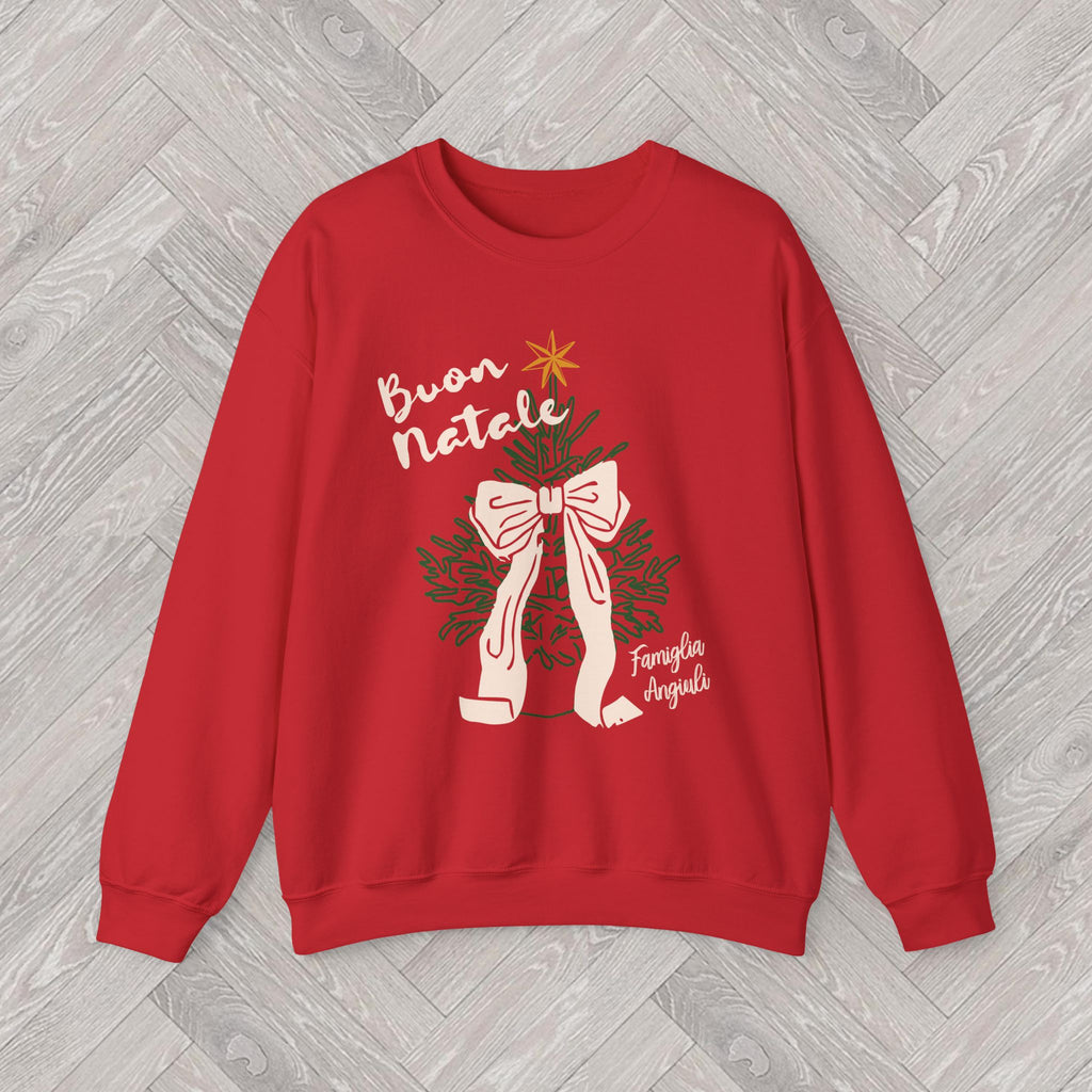 Close-up of the Buon Natale Christmas sweatshirt design with festive Italian lettering, green Christmas tree branches and a ribbon bow.