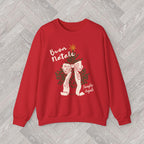Close-up of the Buon Natale Christmas sweatshirt design with festive Italian lettering, green Christmas tree branches and a ribbon bow.