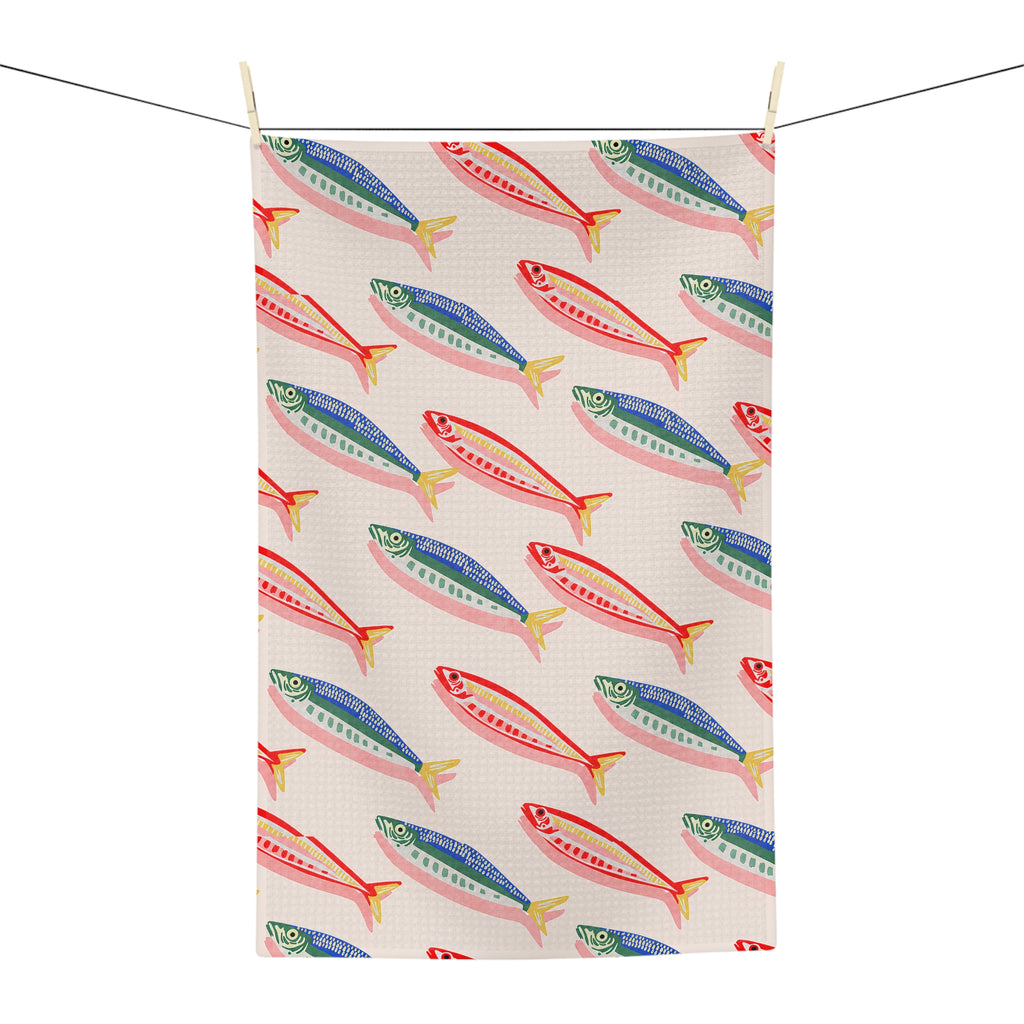 Elegant Mediterranean fish pattern tea towel adding seaside charm to kitchens, holiday homes and coastal interiors.